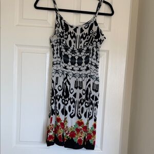 Chic Black and White Dress with Red Floral Design